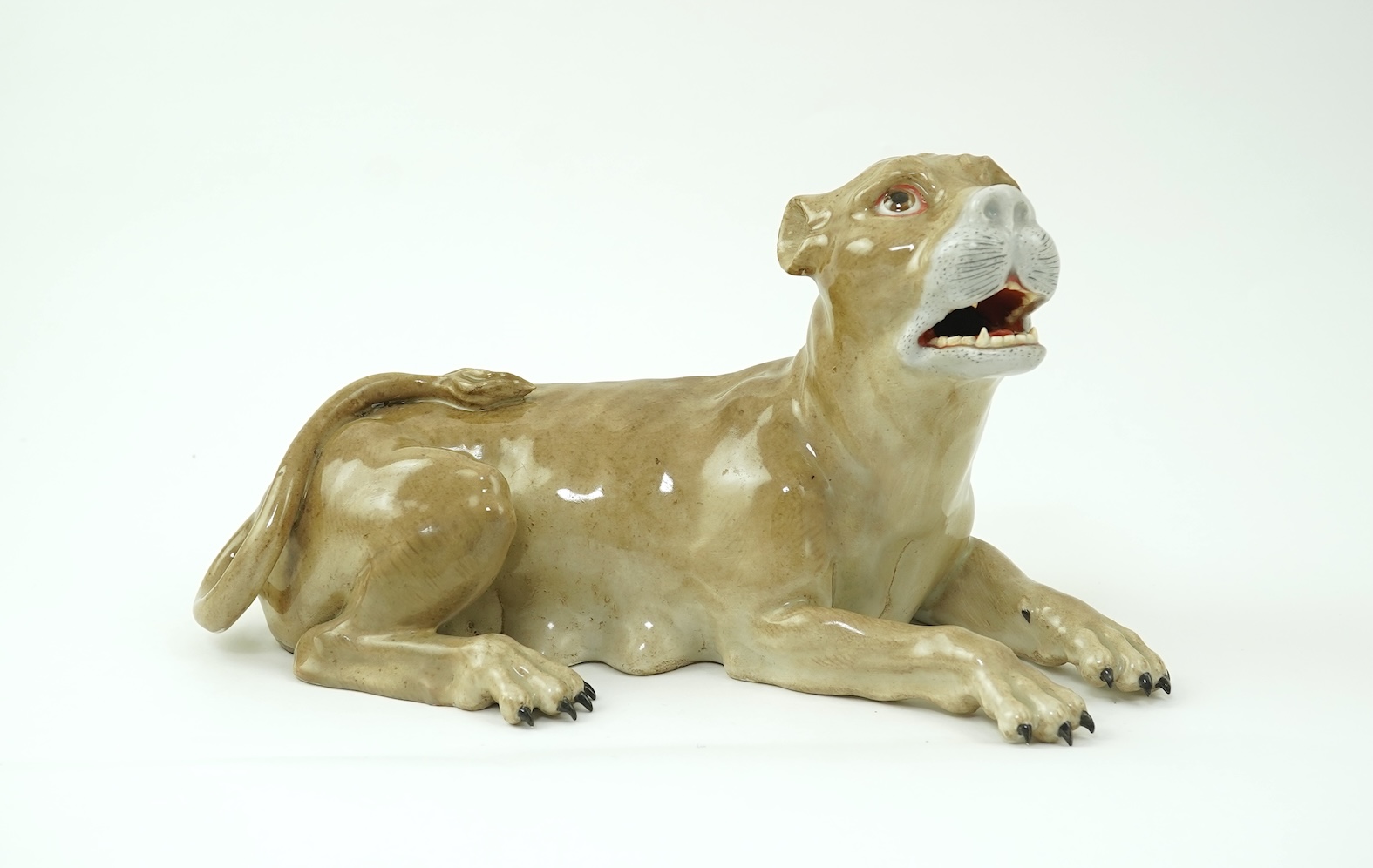 A Meissen model of a recumbent lioness, after J. J. Kandler, 19th century